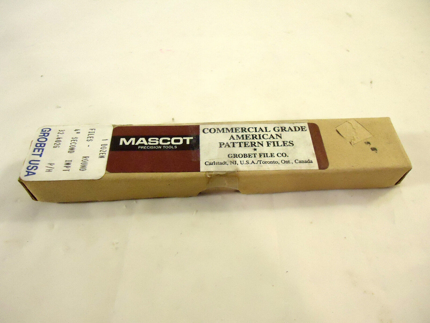 Grobet File, Mascot Div., India, 4" Long Round Files, 2nd Cut, 1 Box - 12 Files.