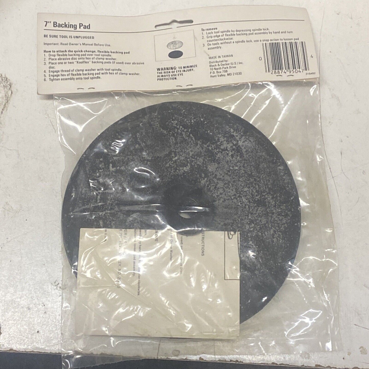 Black & Decker 95-047, 7” Backing pad with clamp washer and 5/8-11 thread.