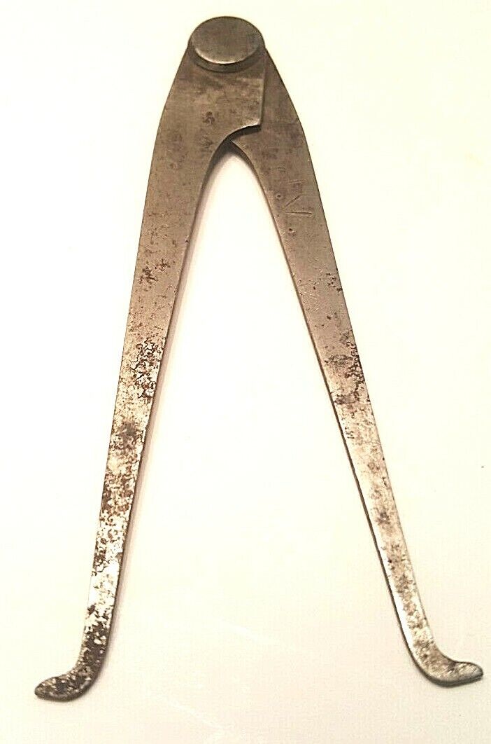 P Lowentraut 4" Inside Firm Joint Caliper, w/"P.L." inside a Horiz. Diamond Logo