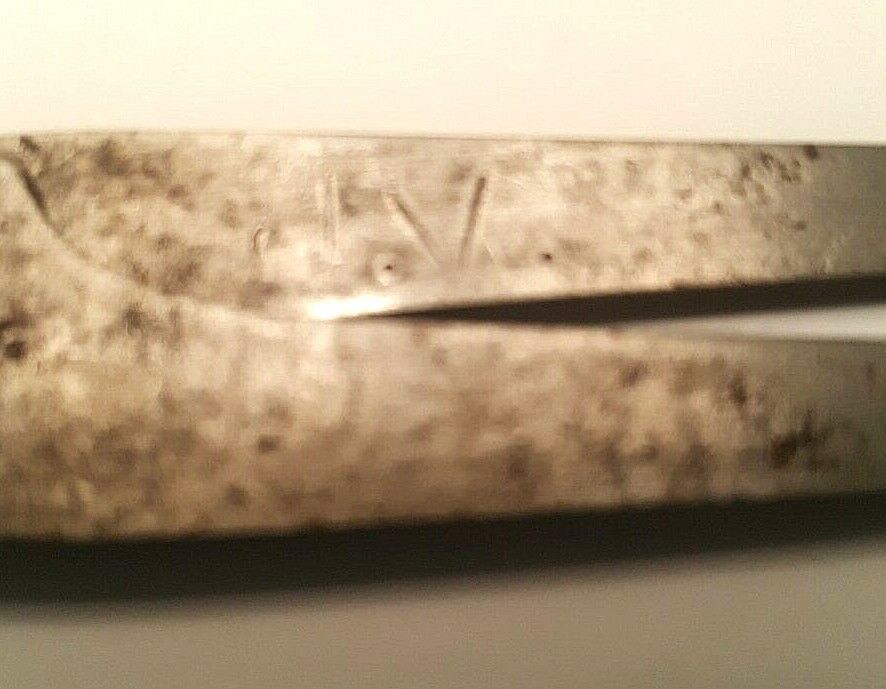 P Lowentraut 4" Inside Firm Joint Caliper, w/"P.L." inside a Horiz. Diamond Logo