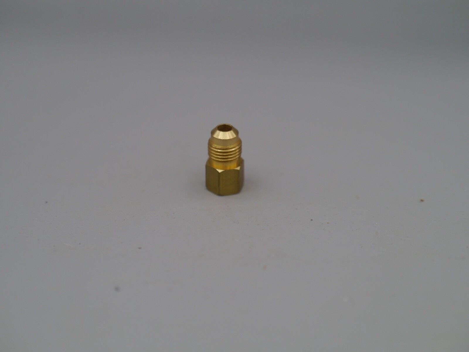 Mastercool Inc, 90366, 1/4 female x 1/2-20 male connector.