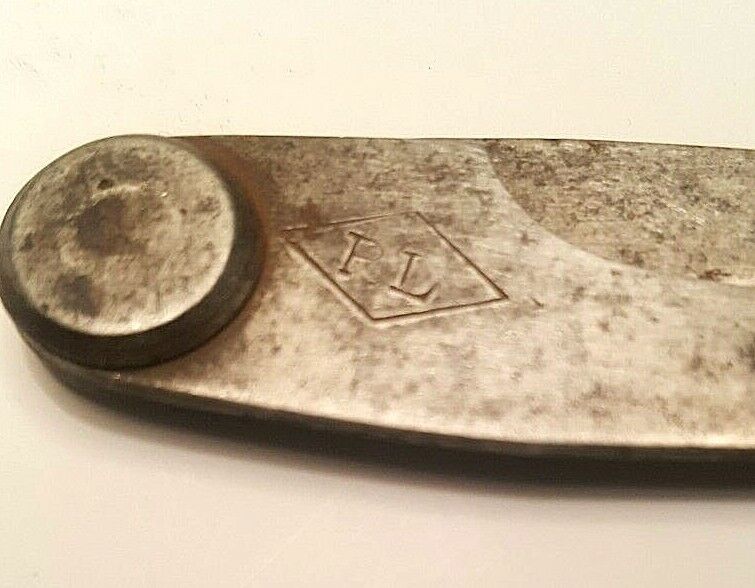 P Lowentraut 4" Inside Firm Joint Caliper, w/"P.L." inside a Horiz. Diamond Logo